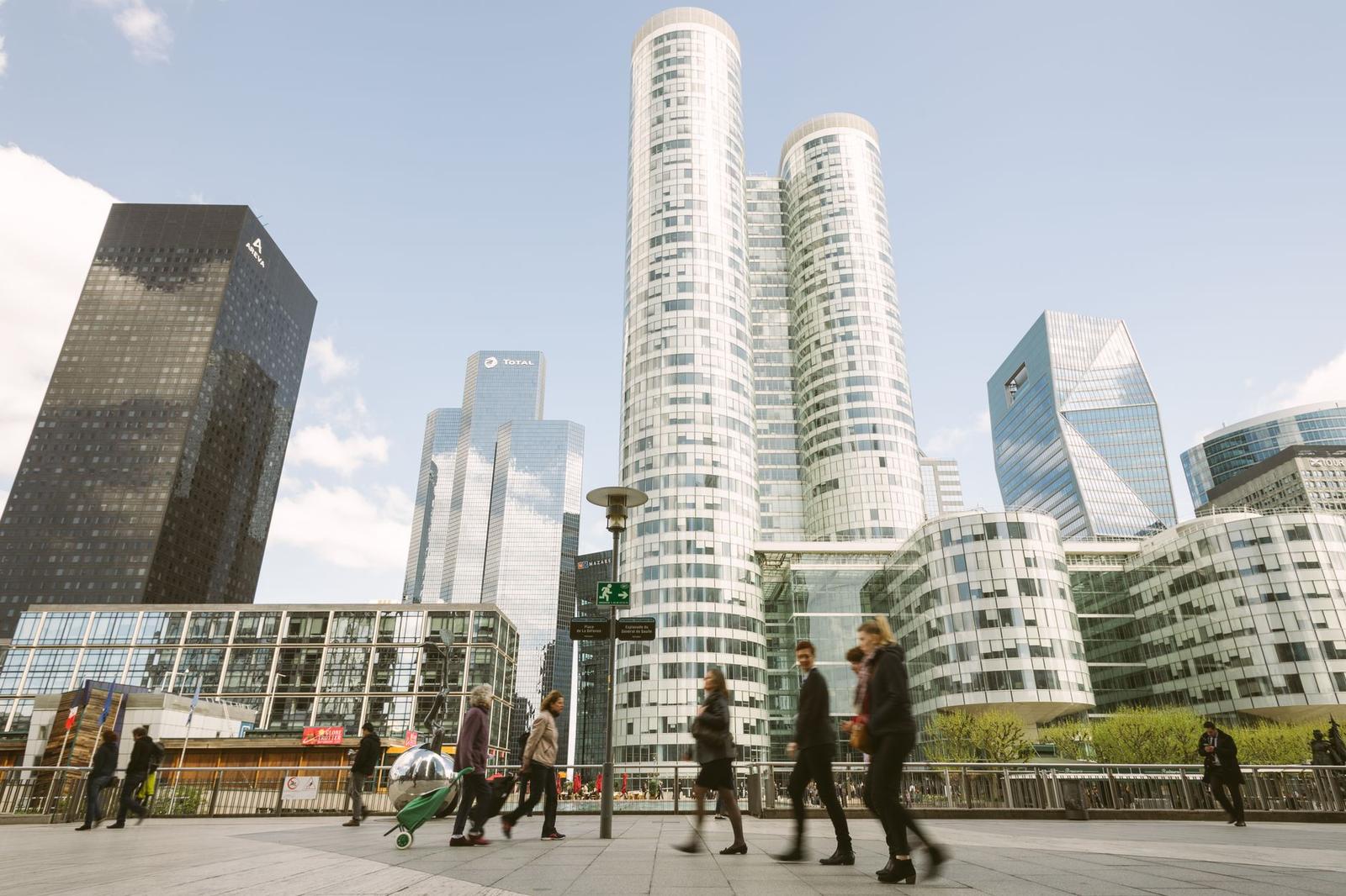 People Walking near High Rise Buildings