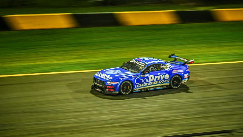 High Speed Racing Car on Night Race Track
