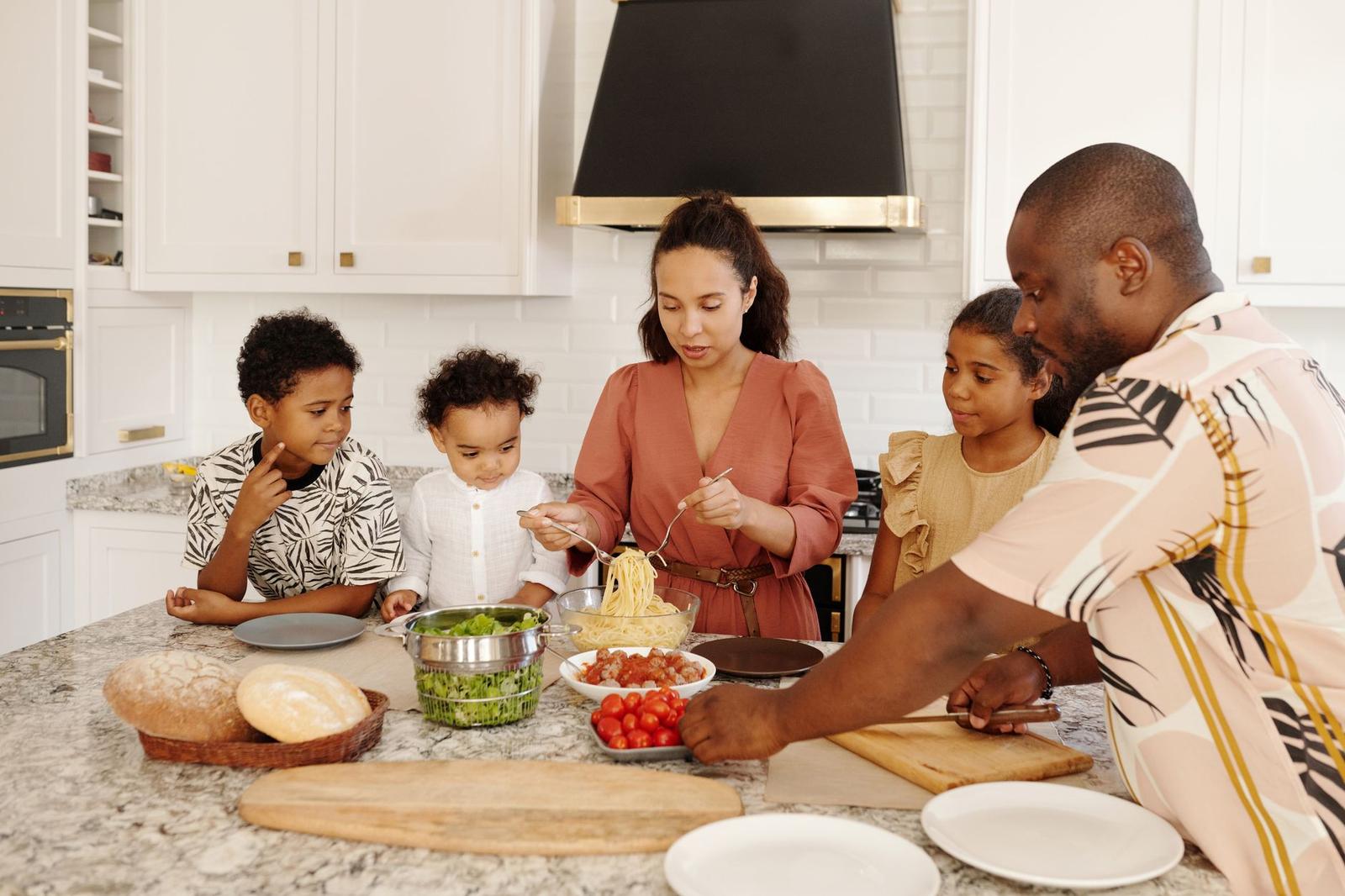 A Family Preparing Food in the Kitchen Togeher